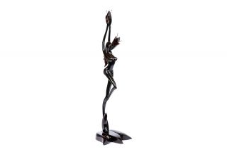 Girl with flower sculpture 